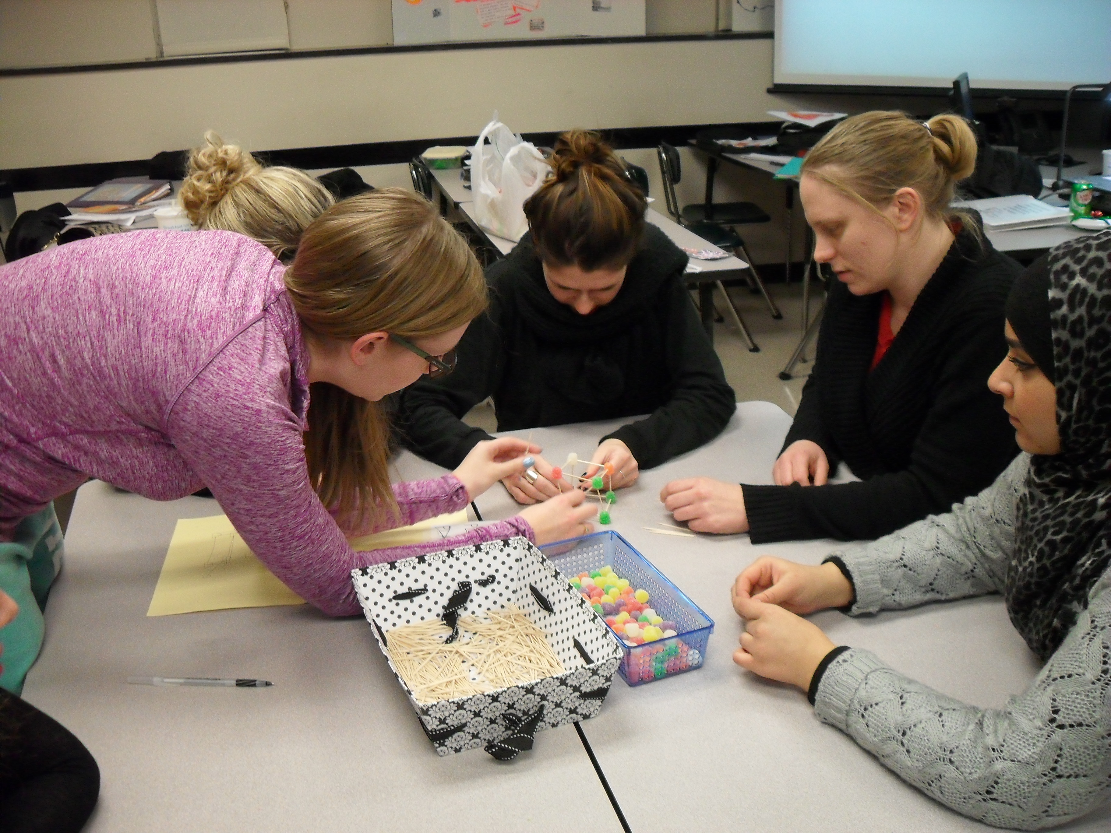 Children and Families students working with math manipulatives.