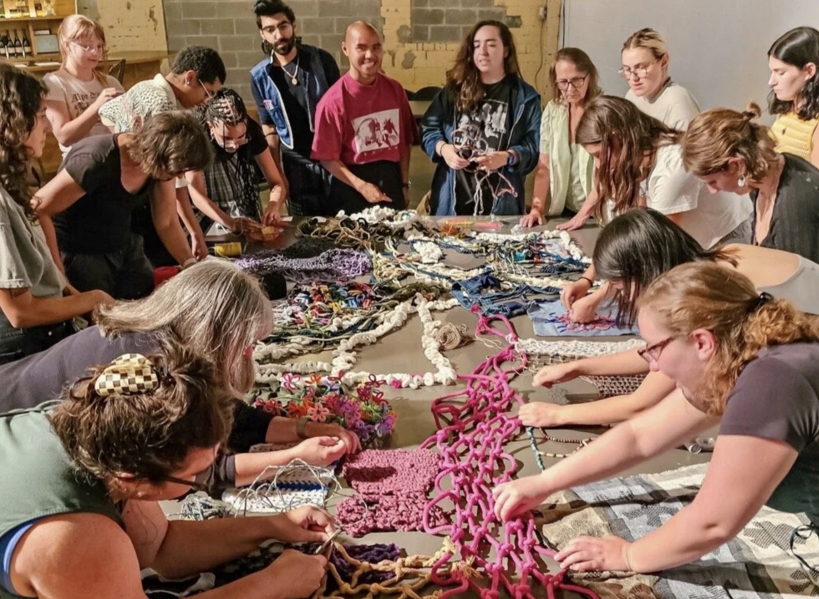 Fiber Club participants share session where members bring their own “net” to mend together for an upcoming “Mending of the Net” exhibit at MOCAD in August 2023. Photo courtesy of Fiber Club