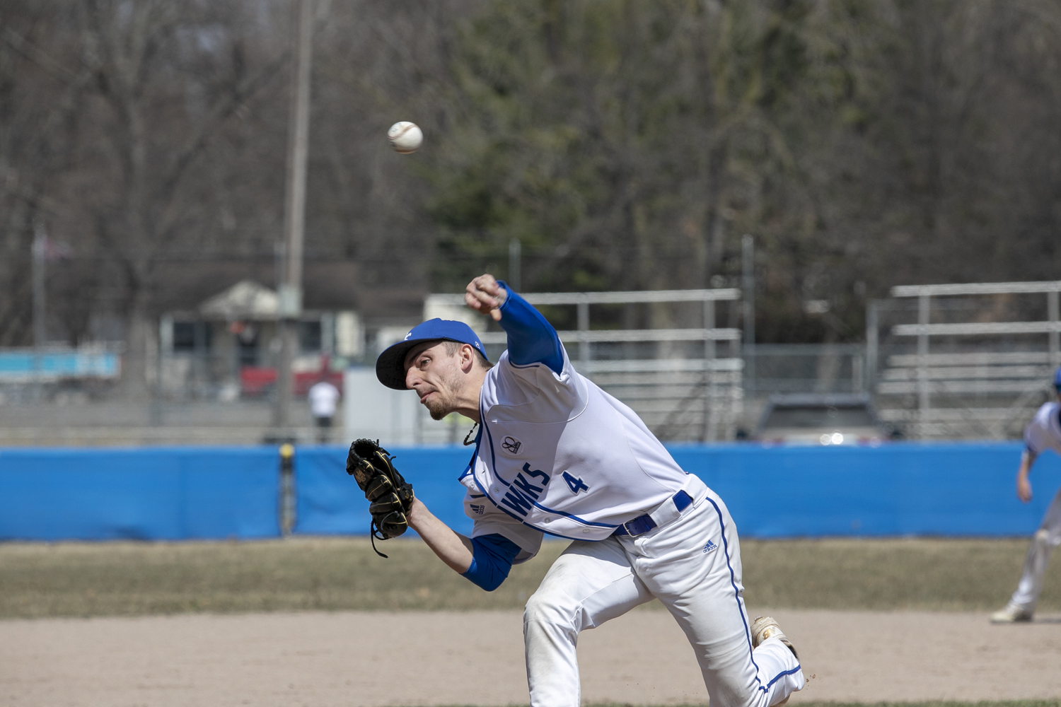 Photo of an HFC baseball player pitching