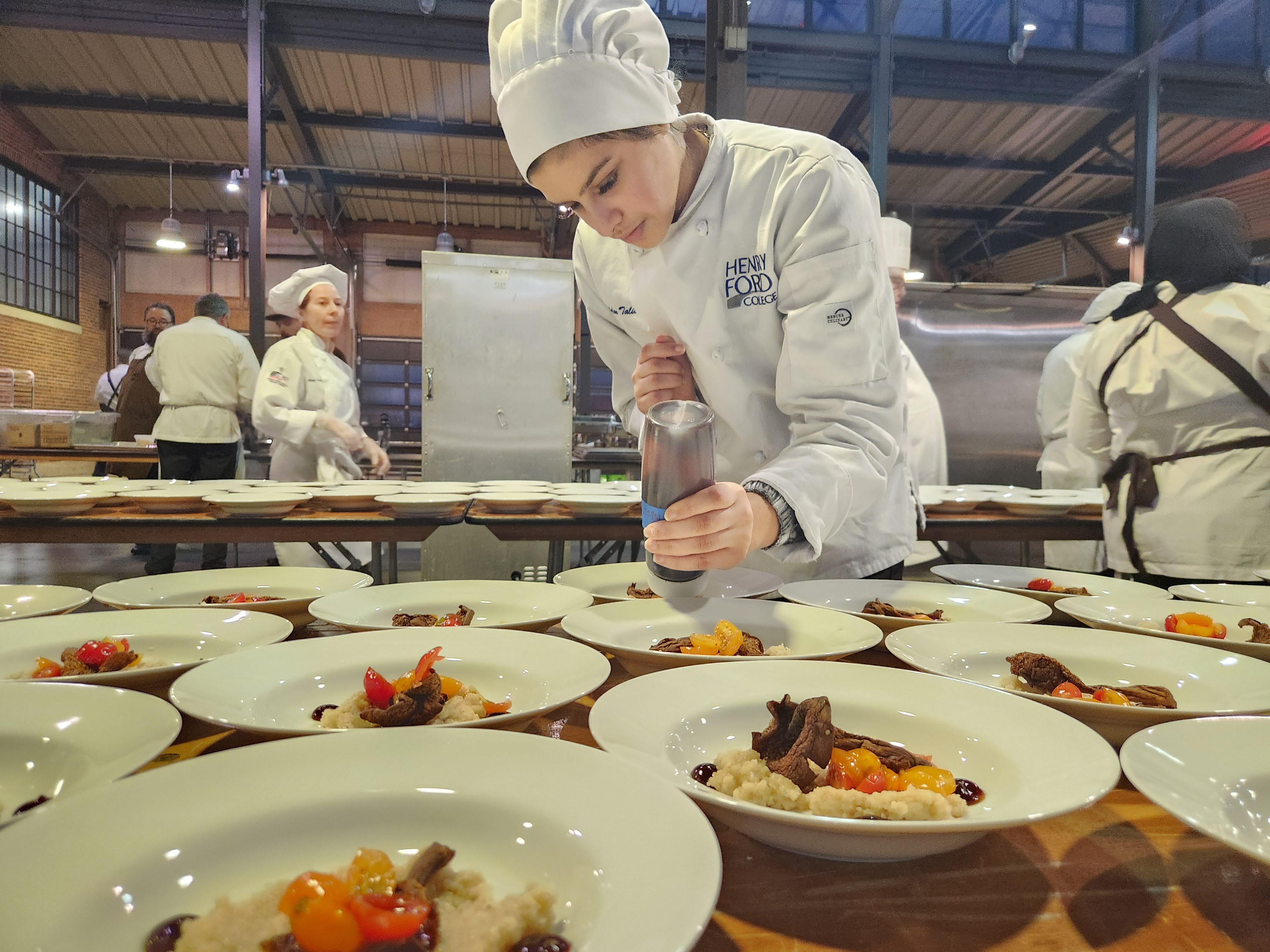 HFC culinary student at Eastern Market Harvest Gala Oct. 14, 2022, Detroit. Photo courtesy HFC Culinary Arts