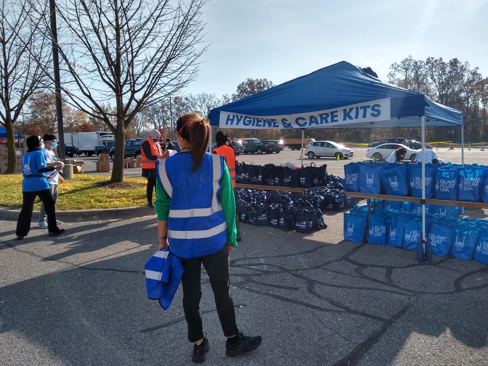 Photo of hygiene and care tent and volunteers at Day of Dignity event in Dearborn, Nov. 7, 2020