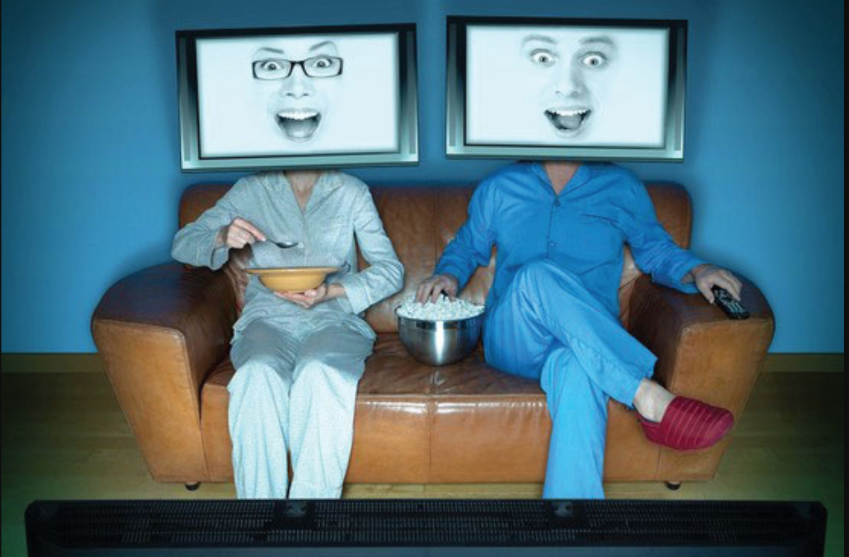 Photo of two people with television heads 