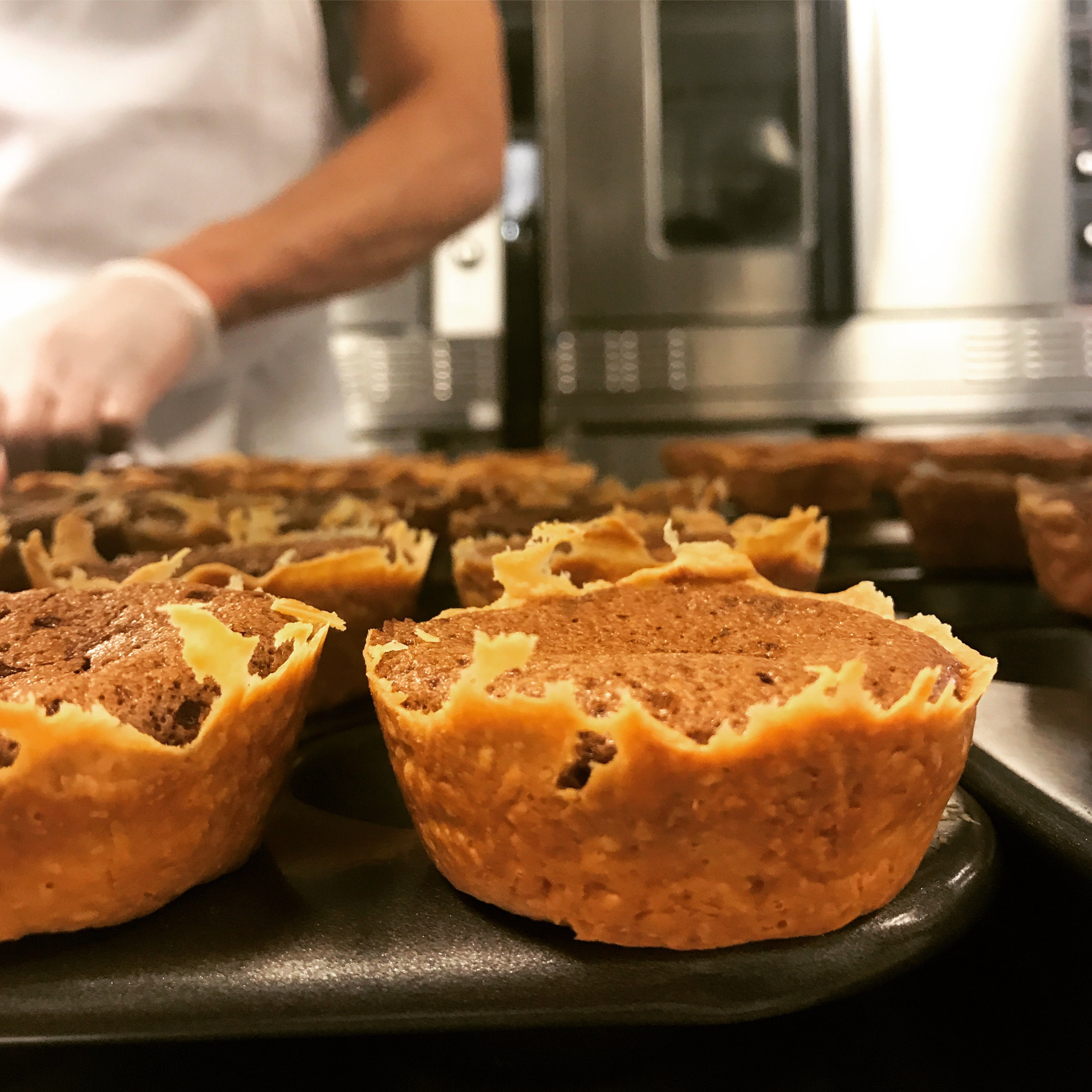 Picture of A chef working on tarts