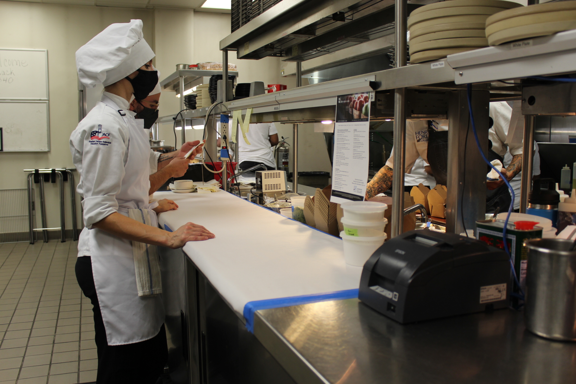 Culinary arts students in Fifty-One O One kitchen this month photo by Muna Saleh