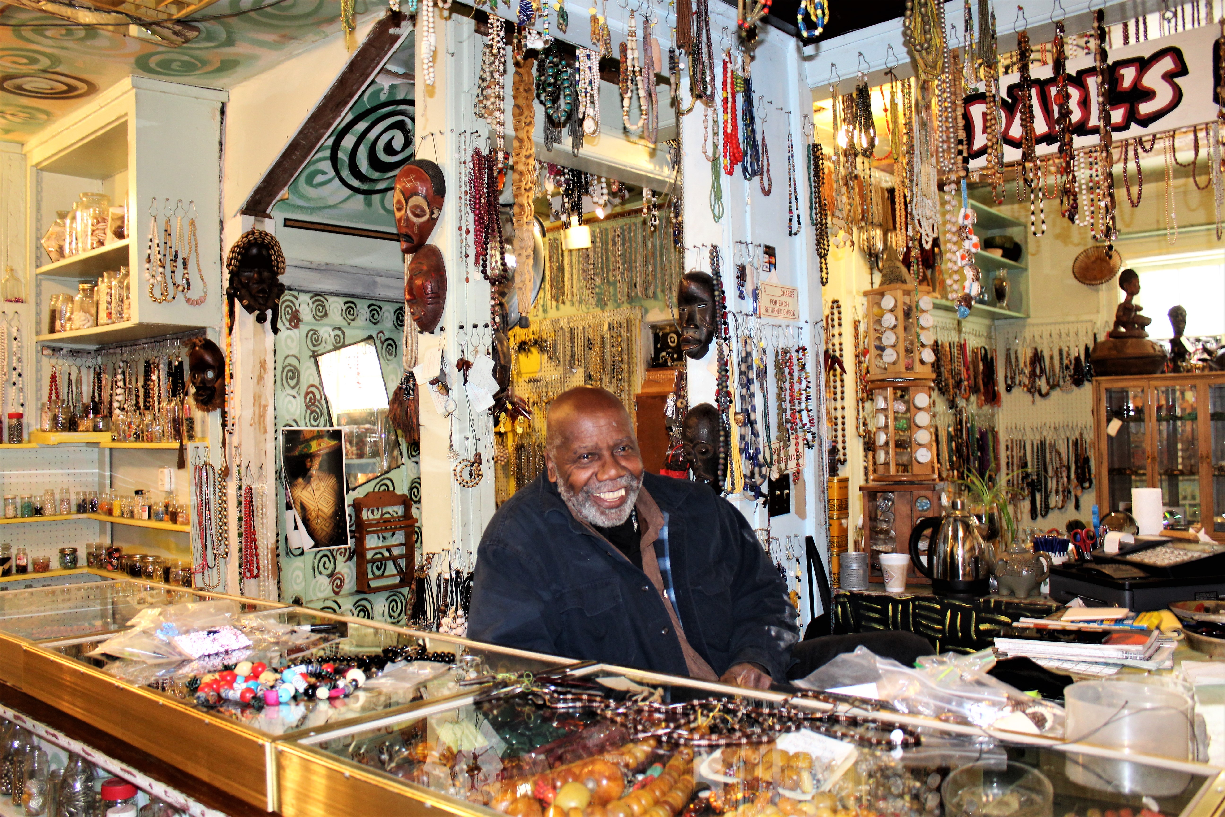Olayami Dabls inside the African Bead Museum gift shop.