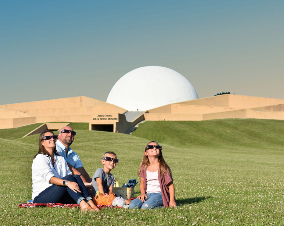 Family viewing total solar eclipse at Armstrong Air and Space Museum in Wapakoneta, Ohio, April 8, 2024. Photo courtesy The Ohio History Connection Family viewing total solar eclipse at Armstrong Air and Space Museum in Wapakoneta, Ohio, April 8, 2024. Photo courtesy The Ohio History Connection
