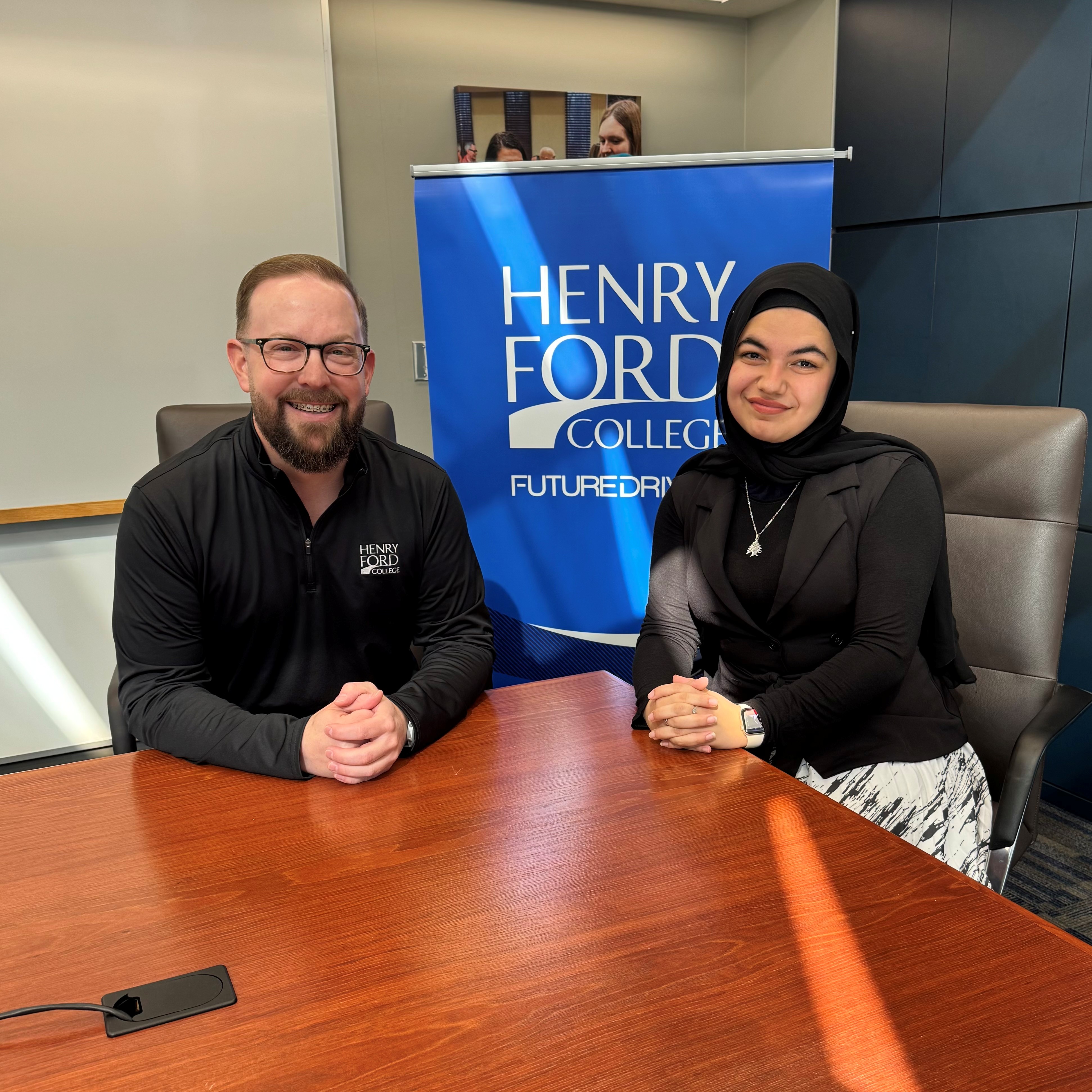 Henry Ford College President David Knezek, Jr. (left) and Mariam Dawi (right). Photo courtesy of Mariam Dawi. Henry Ford College President David Knezek, Jr. (left) and Mariam Dawi (right). Photo courtesy of Mariam Dawi.
