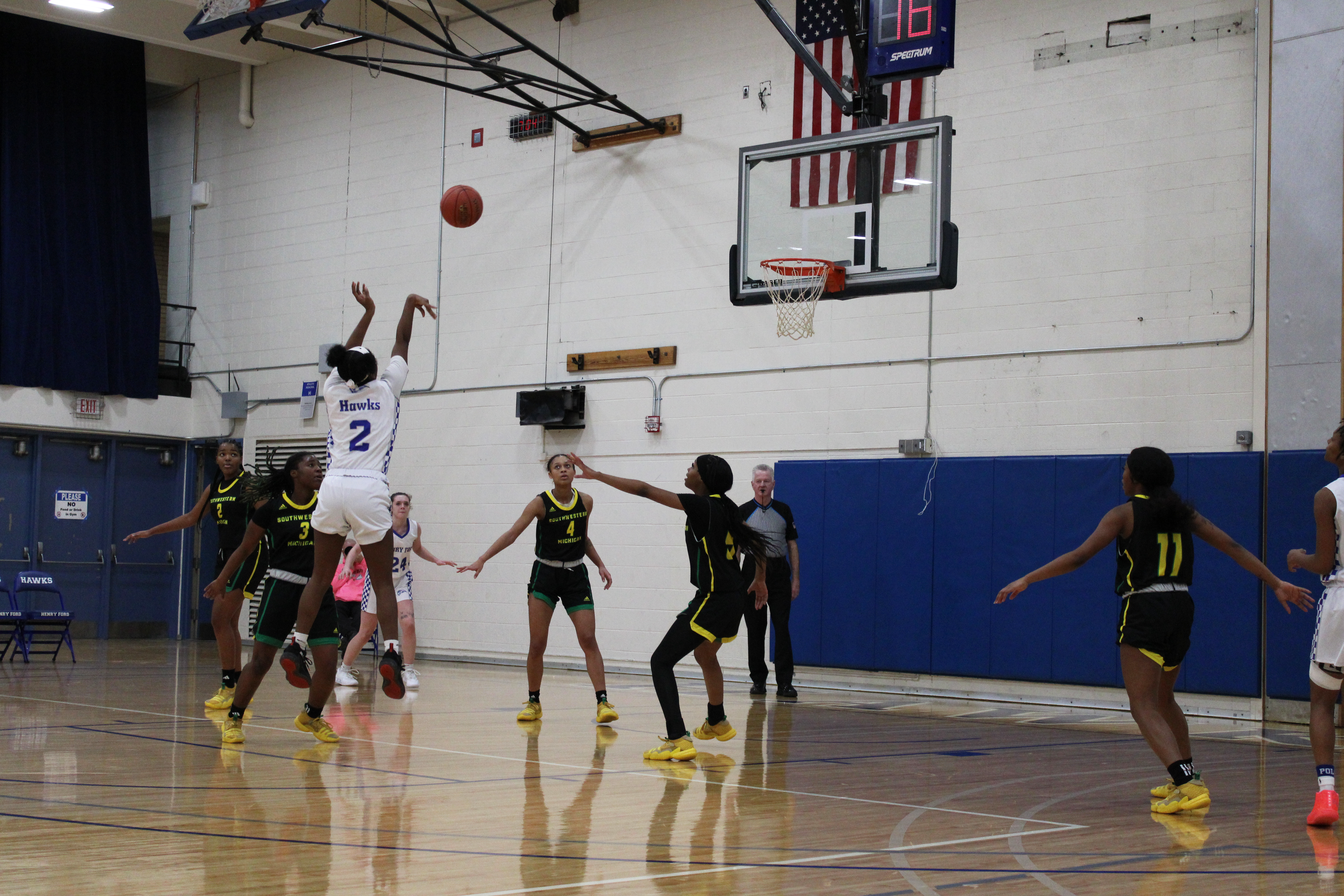 Henry Ford College Hawks basketball player, Bre’Kayla Davis (#2), goes up for the jumpshot against Southwestern Michigan College. Photo by Ashley Davis