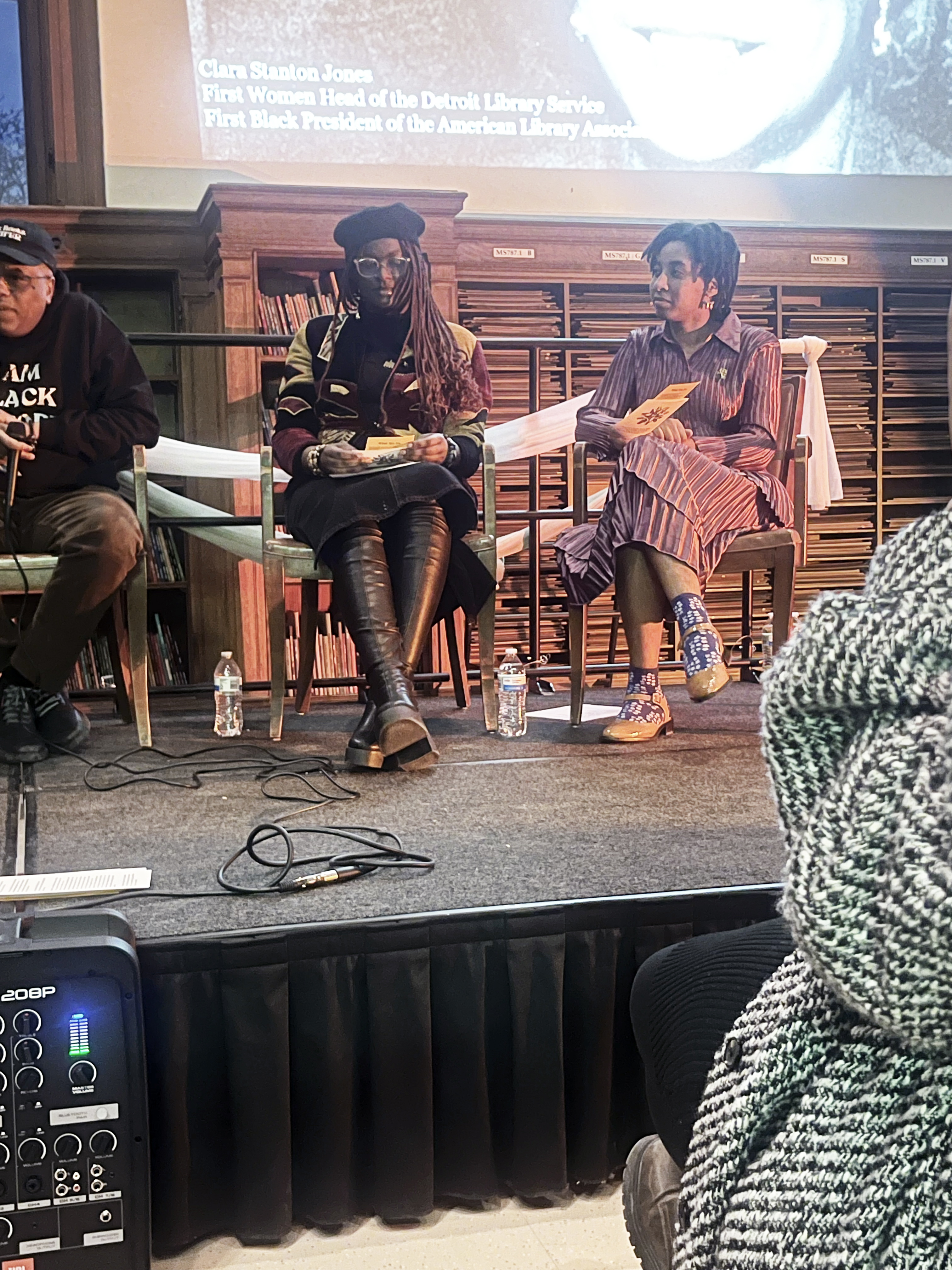 Midnight Care Collective founders,Triniti (iii) and saylem mississippi celeste, reading from their “Statement on Care” at the Black Salt Press launch event, Feb. 6, Detroit Public Libary main branch.