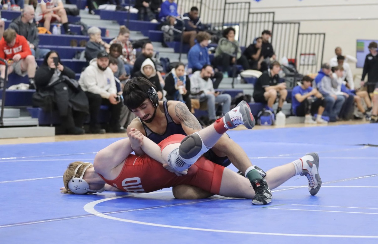 Vincente Navarro pinning opponent on way to winning the championship match at Whizzer Open, Henry Ford College, Dearborn, MI. Feb. 1, 2026.