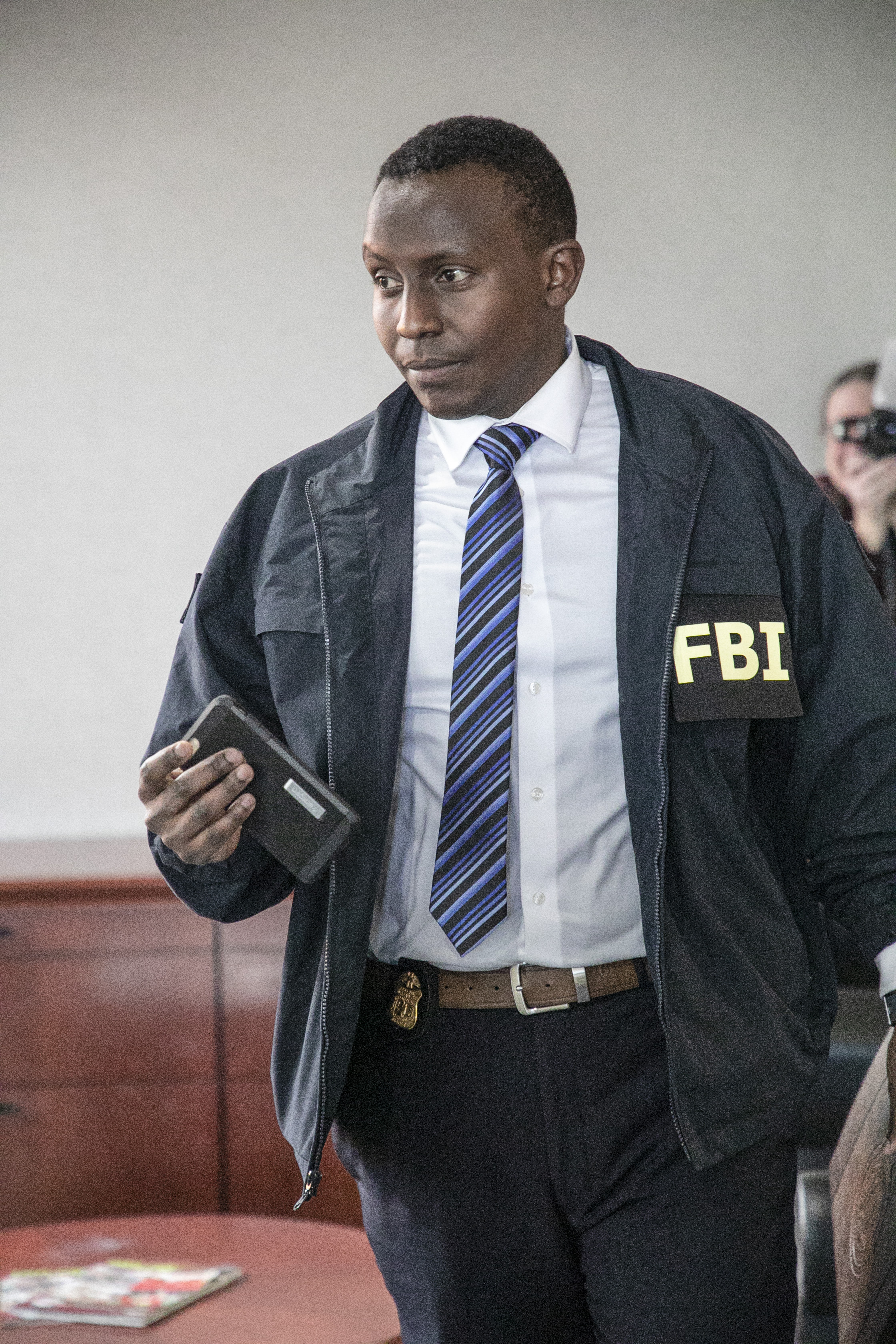 Photo of an FBI agent at Taylor City Hall