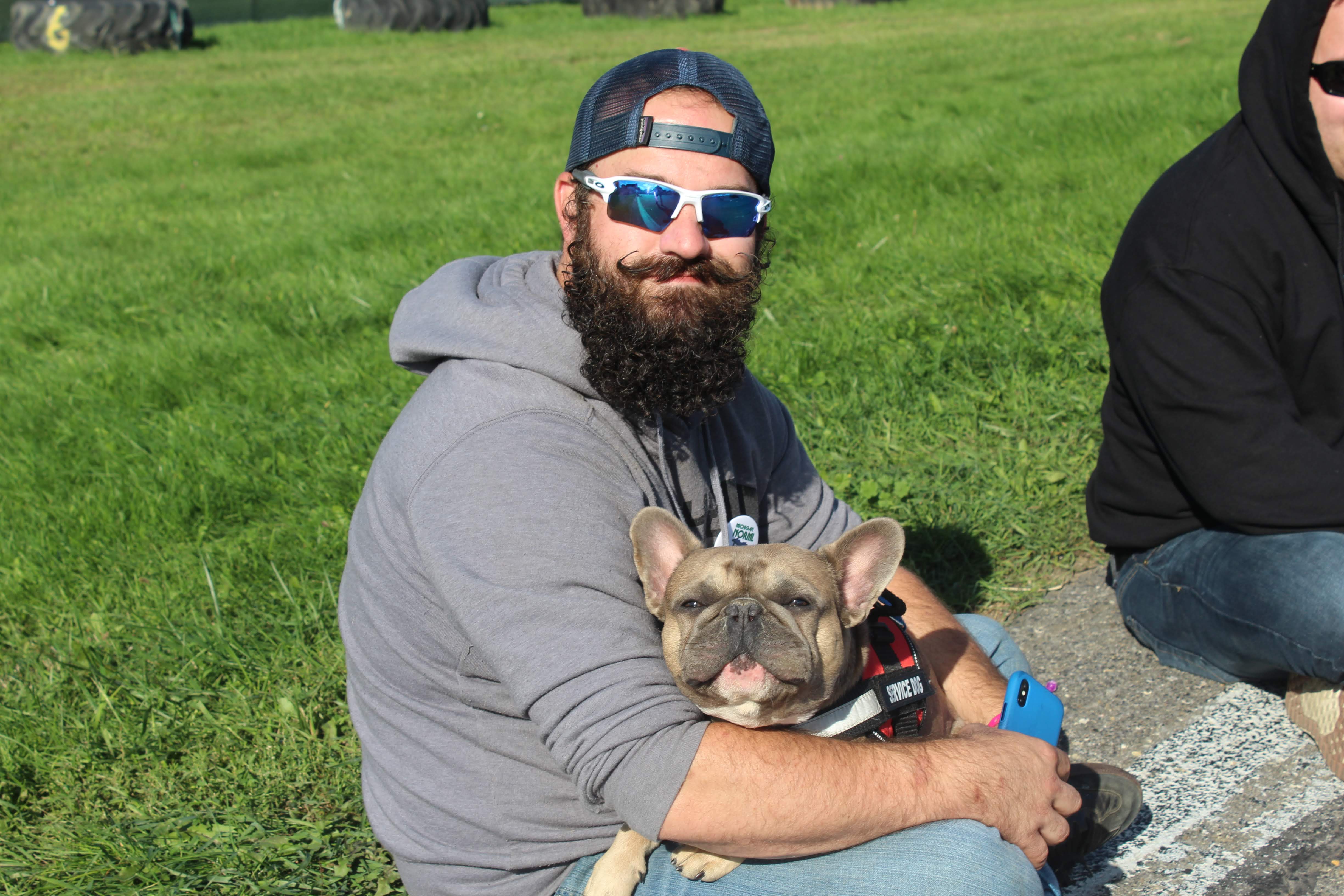 Photo of Cannabis Cup attendee Levi with his French Bulldog, Kermit