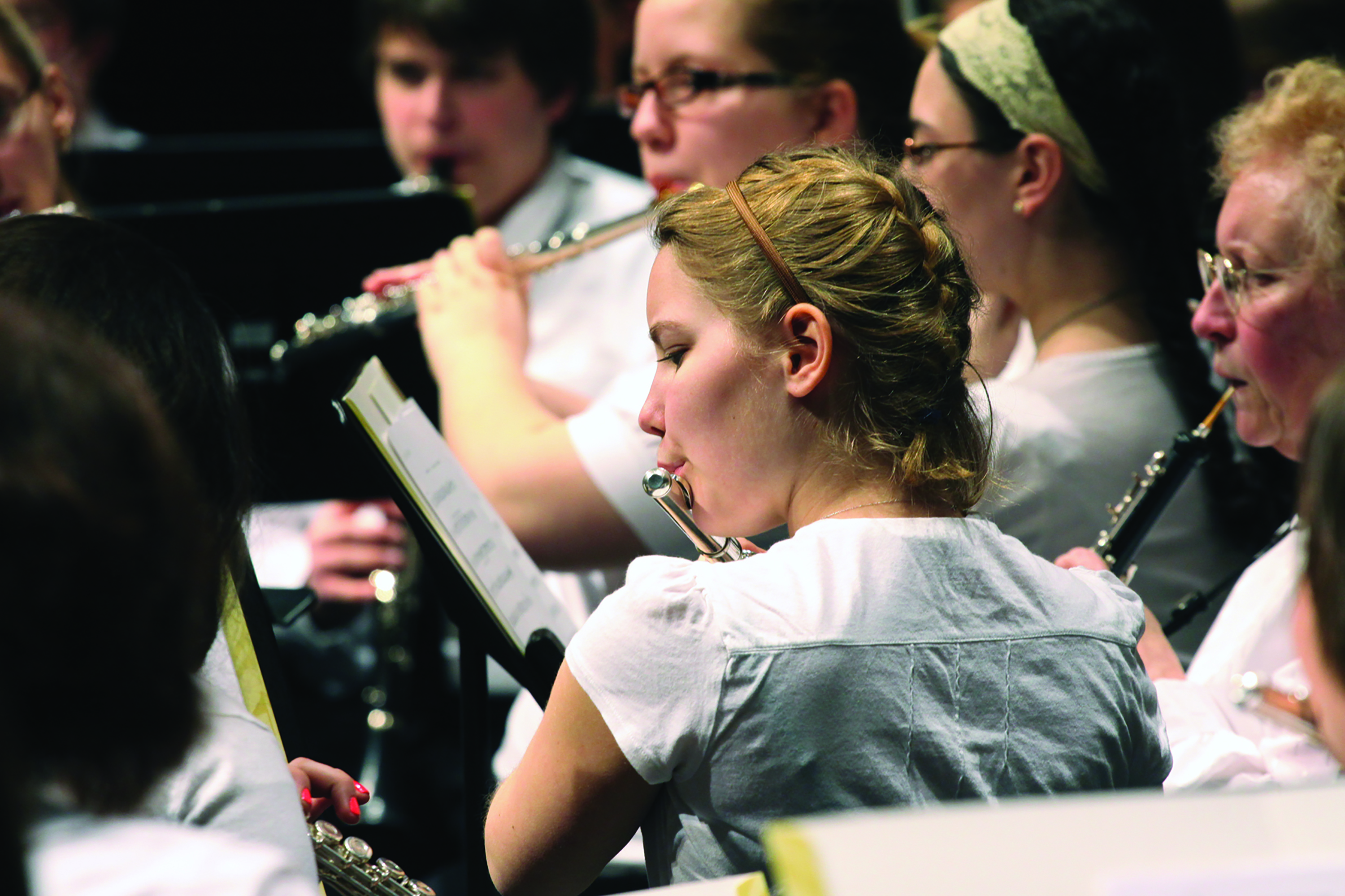 Group of music students playing instruments