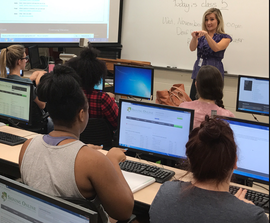 Photo of Professor Jennifer Stewart instructing an ASL course at HFC