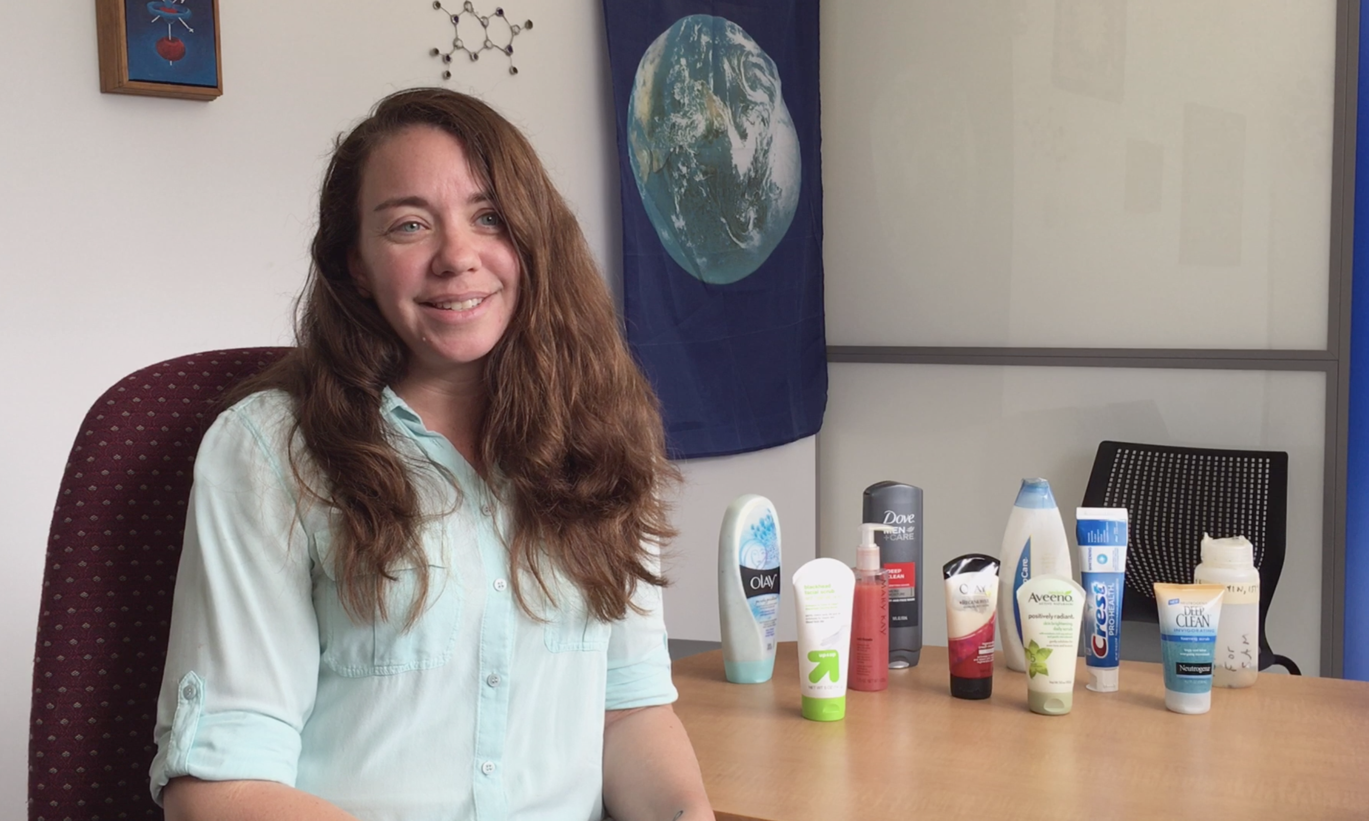 Sam Mason with shampoos and liquid soaps with micro-plastics.