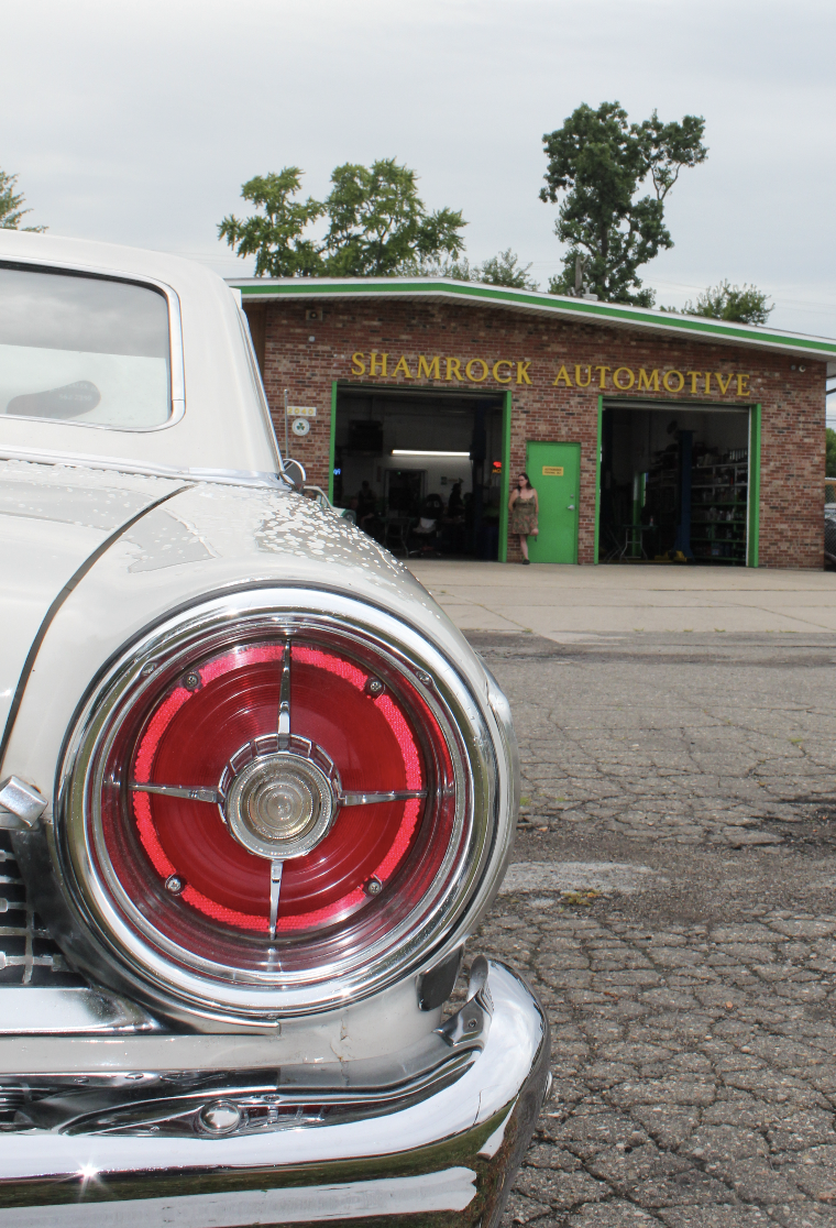 Photo of tail lights of Ford Galaxie classic car from the 1960s in front of Shamrock Auto. Photo by Christopher Namyst