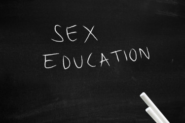 Chalkboard with "Sex Education" written in chalk.