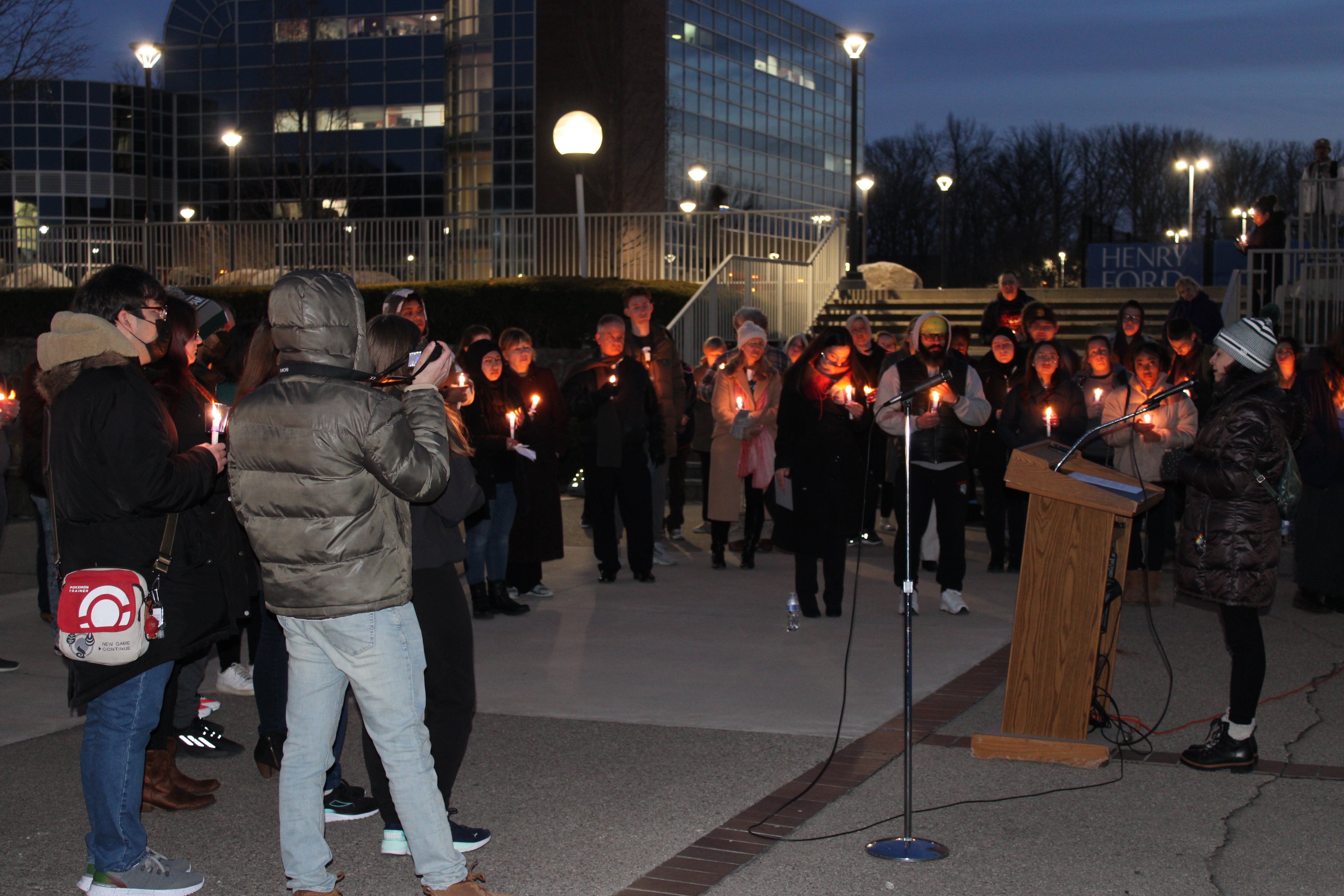 Students, staff, and faculty gather at Henry Ford College in Dearborn, Michigan, for a vigil on Feb. 20, 2023, remembering the victims of the MSU school shooting. Photo by Ashley Davis
