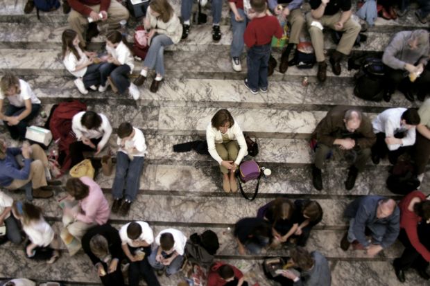 Graphic showing a woman sitting by herself while surrounded by people