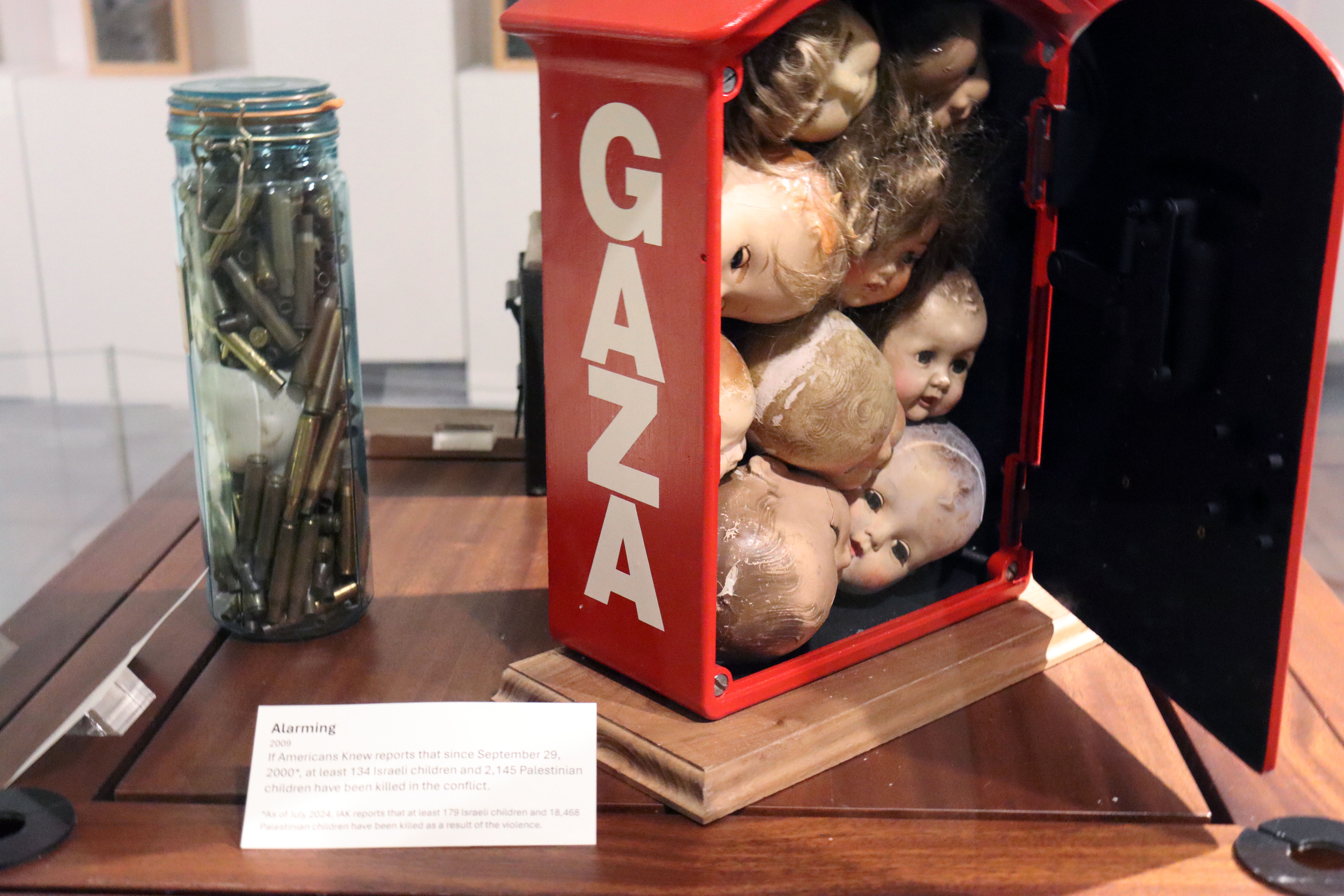 “Alarming” (2009) by Rajie Cook. Placard reads “If Americans knew reports that since September 29, 2000, at least 134 Israli children and 2,145 Palestinian children have been killed in the conflict.” Photo by Bisan Azazi “Alarming” (2009) by Rajie Cook. Placard reads “If Americans knew reports that since September 29, 2000, at least 134 Israli children and 2,145 Palestinian children have been killed in the conflict.” Photo by Bisan Azazi