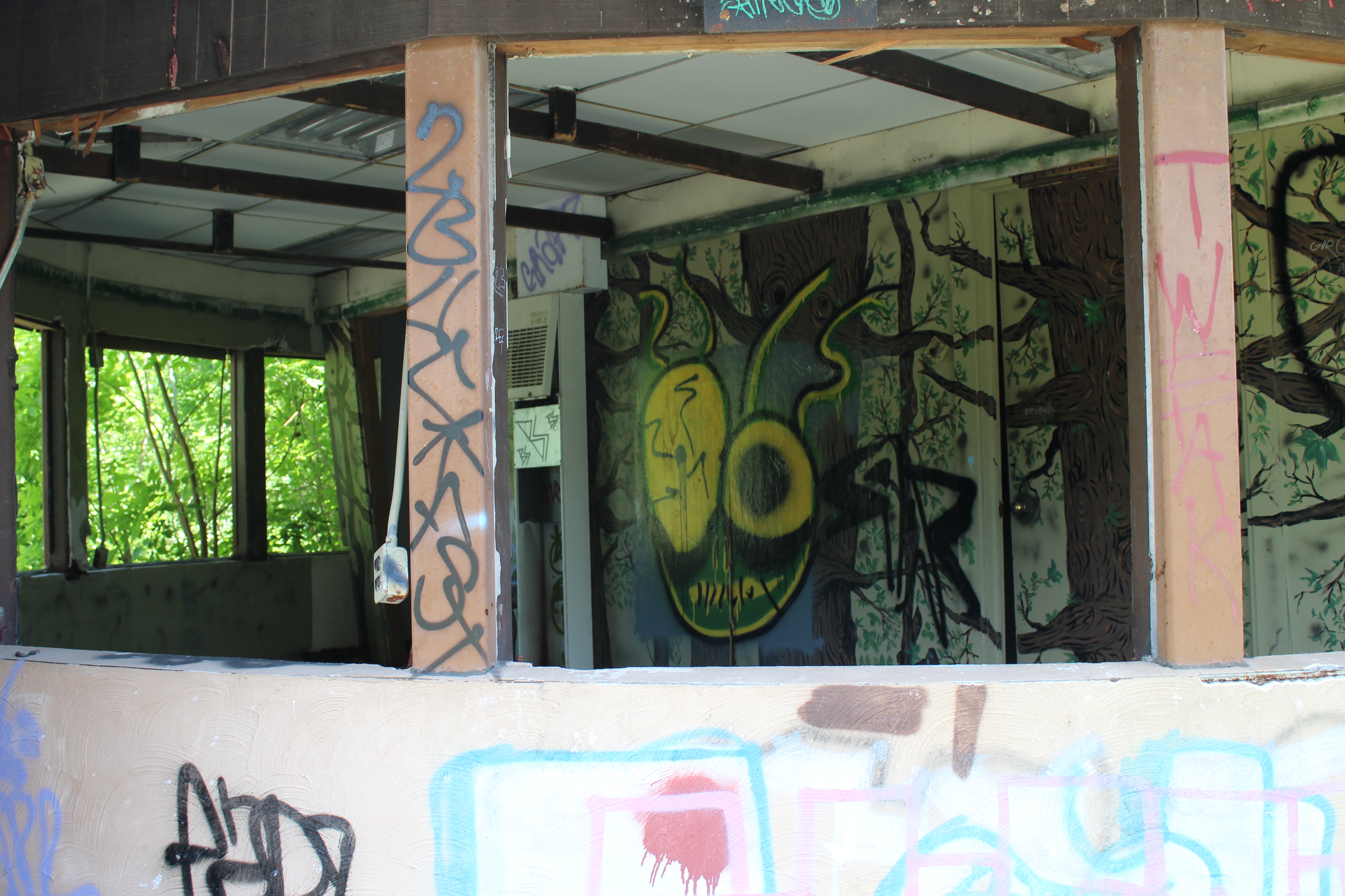 Graffiti on wall of abandoned concession area at Belle Isle Zoo
