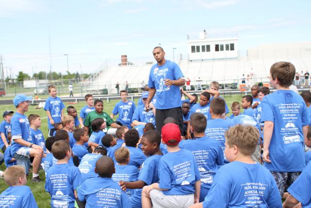 Eric Fowler mentoring boys at a summer camp