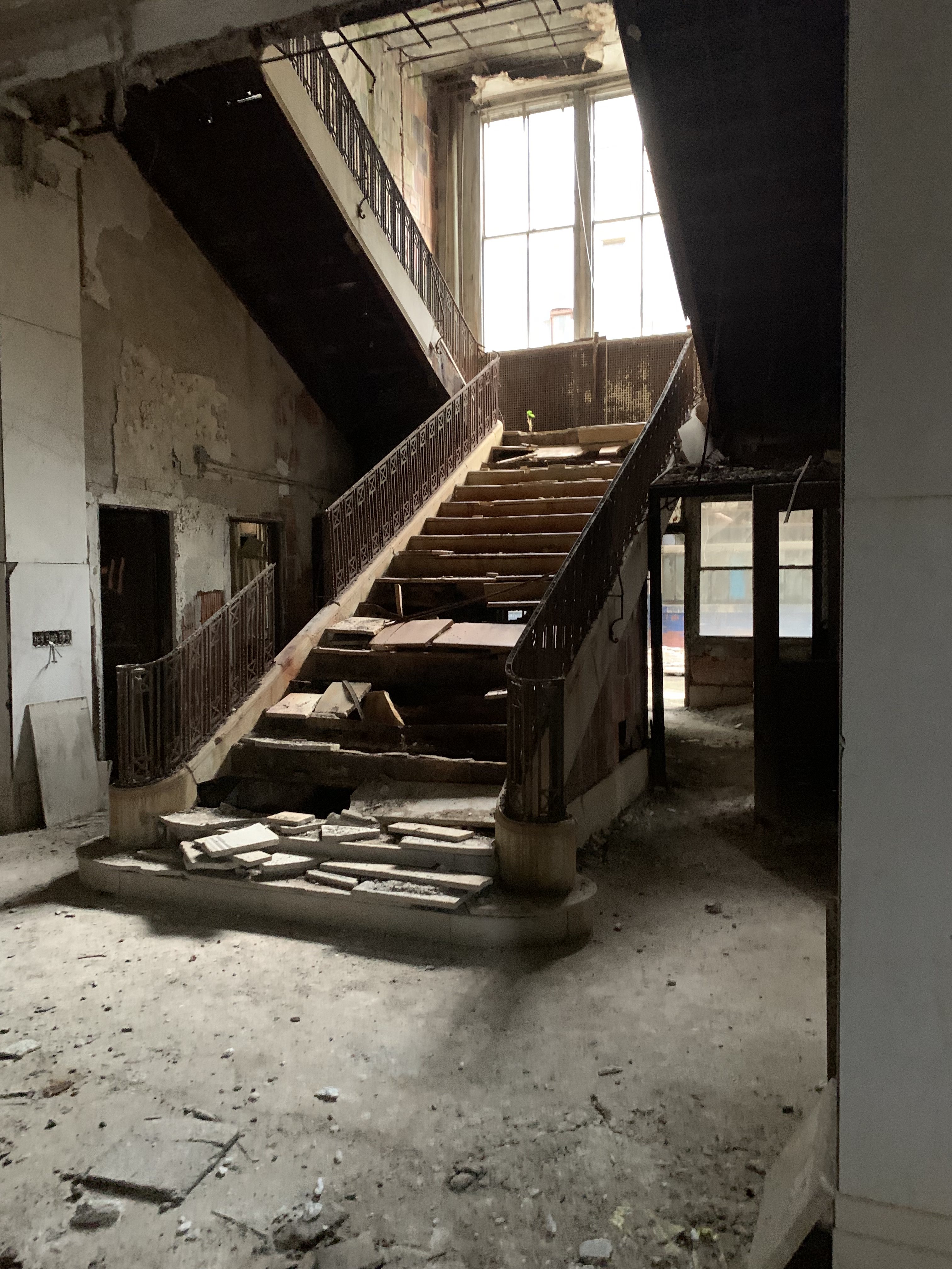 Staircase inside abandoned Ford Highland Park Plant building. Photo by Mirror News staff