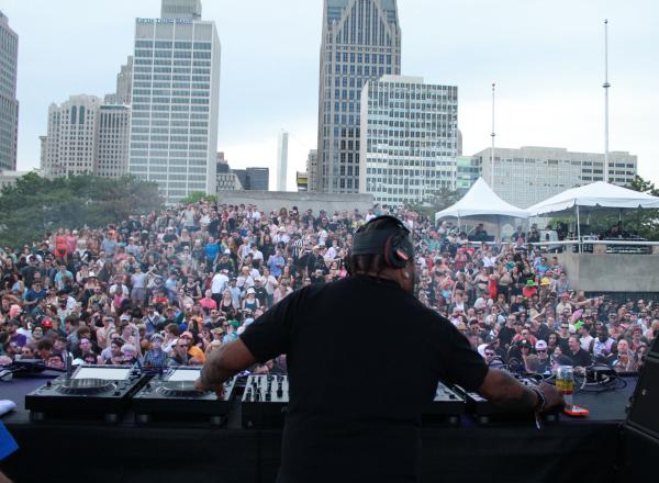 Derrick Carter on stage facing crowd at Movement 2023 electronic music festival in Detroit, MI, May 27, 2023. 