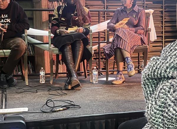 Midnight Care Collective founders,Triniti (iii) and saylem mississippi celeste, reading from their “Statement on Care” at the Black Salt Press launch event, Feb. 6, Detroit Public Libary main branch.