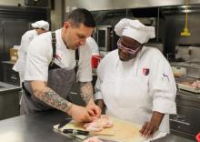 Photo of Chef Joseph Cosenza with student Priscilla Holmes