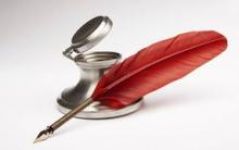 Red feather inkwell pen.