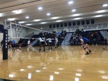 Photo shows volleyball game between HFC Lady Hawks and Saint Clair Community College