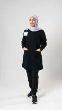 Zynab Al-Timimi modeling scrubs. Photo from the Nisa Scrubs website