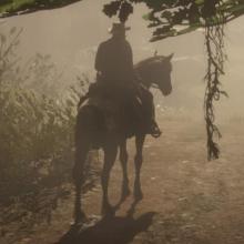 Gameplay screen capture of Red Dead Redemption 2 showing a man riding a horse
