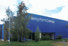 Photo of outside of the Henry Ford College Science building with Henry Ford College sign in large letters.